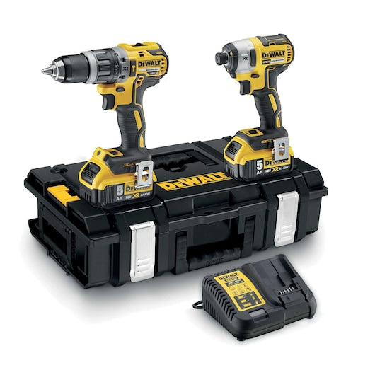 DeWalt power tool set with drill, impact driver, and charger on a white background