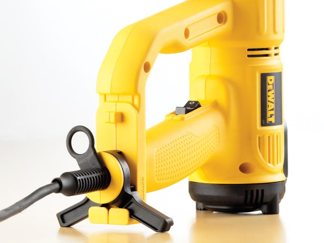 Close-up of Dewalt 2000W yellow heat gun showing handle, power switch, and cord connection.