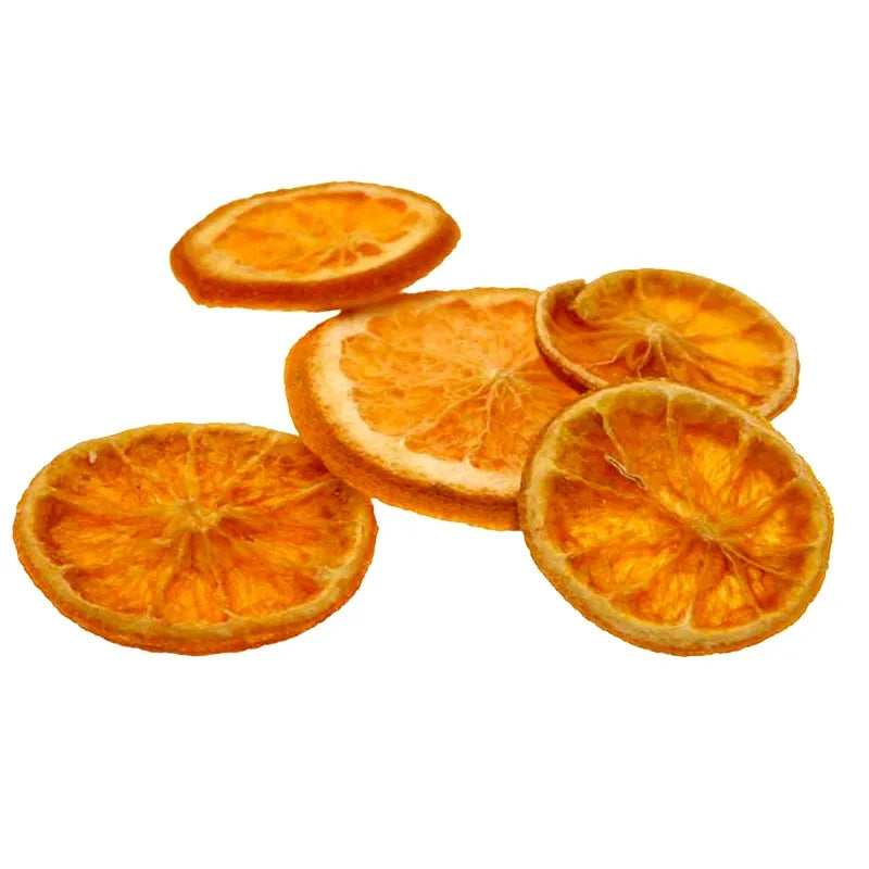 Five natural dried orange slices with warm orange color and rustic texture on white background