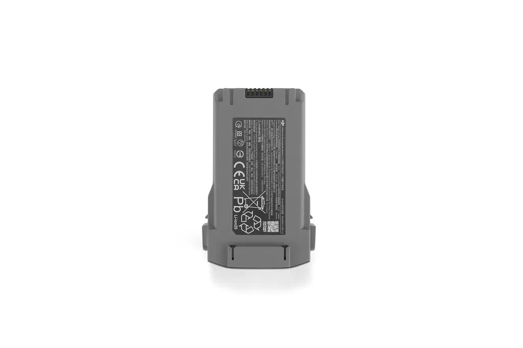 DJI Mini 5 Pro Intelligent Flight Battery shown from the back with safety and recycling labels visible.
