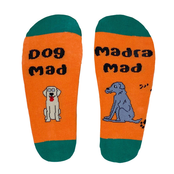 Orange dog-themed socks 8-12, Irish Madra design, cozy and playful. Available at Keans Claremorris.