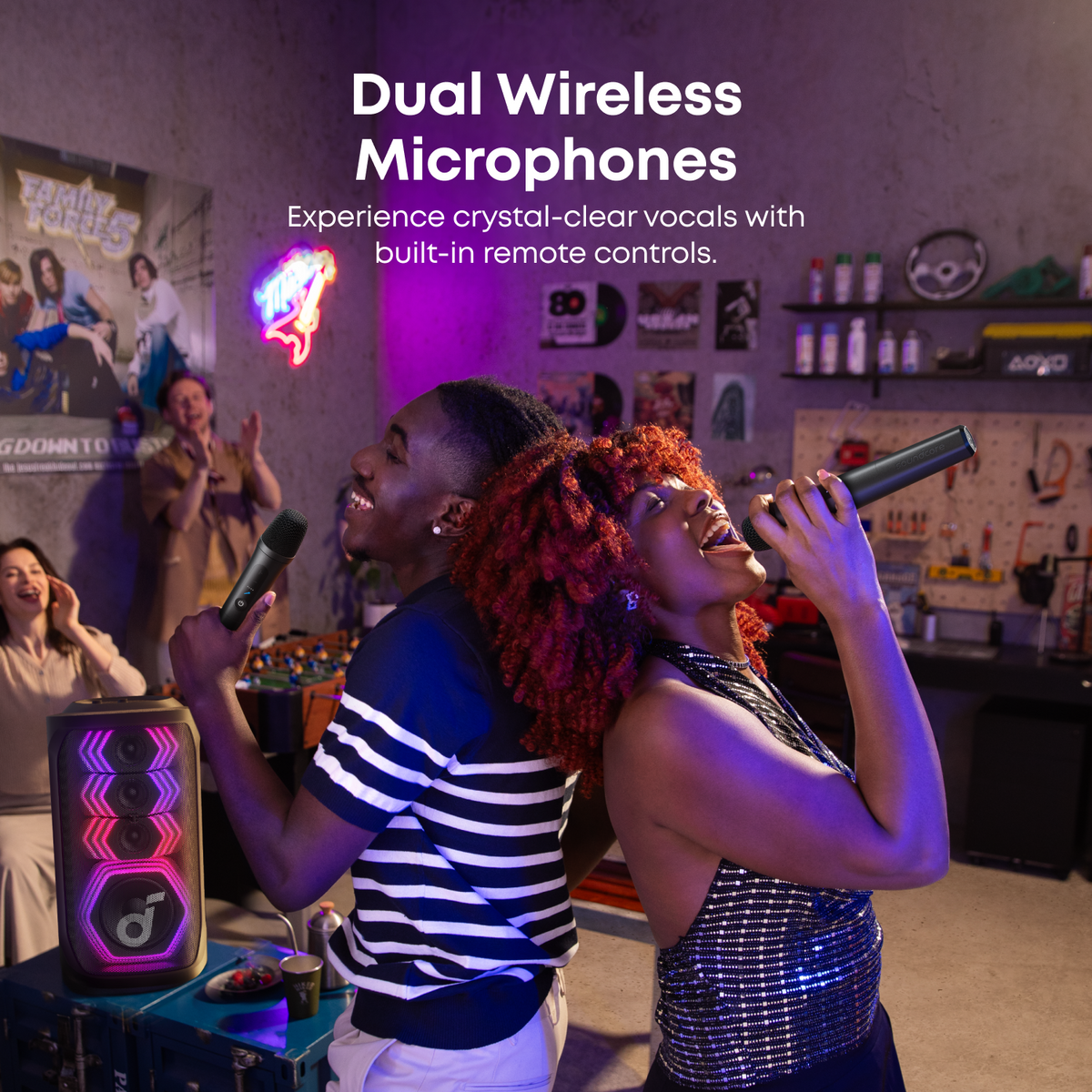 Two people singing with Soundcore Rave 3s Black wireless microphones in a lively room setting.
