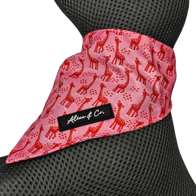 Dog bandana with pink and red safari giraffe print, adjustable, durable collar accessory by Keans Claremorris.