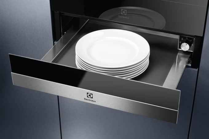 Electrolux 14 cm warming drawer, sleek design for food warming, available at Keans Claremorris.