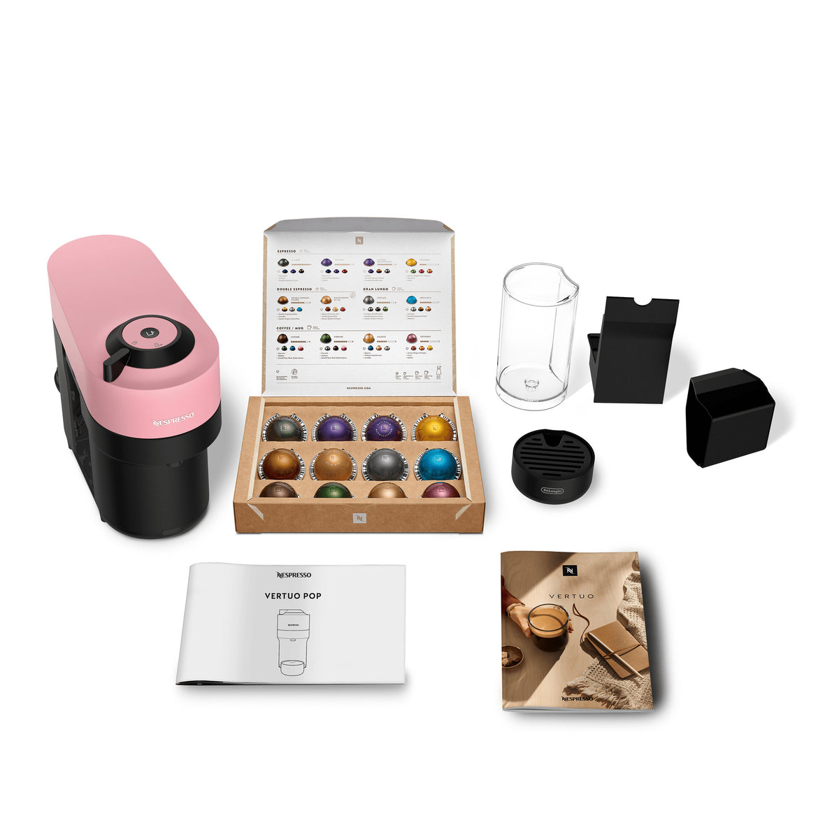 Pink Delonghi Nespresso Vertuo Pop coffee machine with capsule box, water tank, and accessories on white background