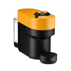 Nespresso coffee machine with orange top and black body on a white background