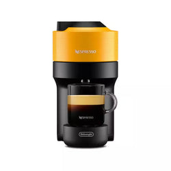 Nespresso coffee machine with a yellow top and black body on a white background