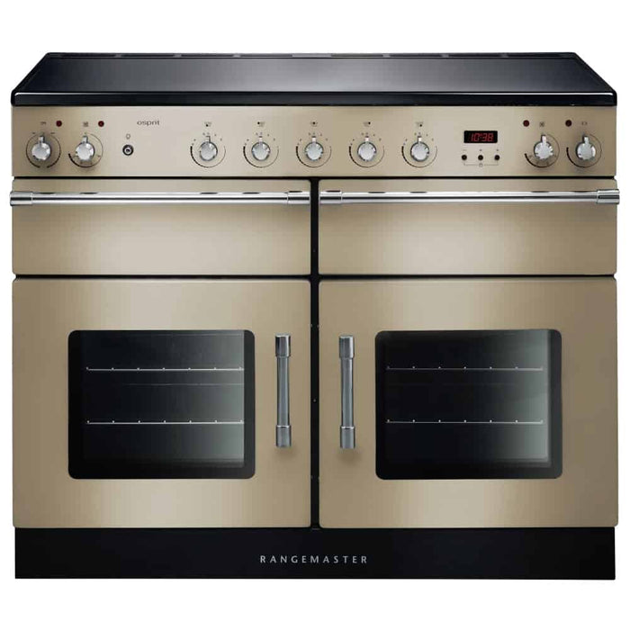 Rangemaster ESPRIT 110 induction range cooker in chrome trim with dual ovens and control knobs on top panel.