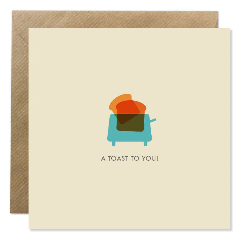 Square birthday card with a blue toaster and two slices of toast, text "A TOAST TO YOU!" on cream background with kraft