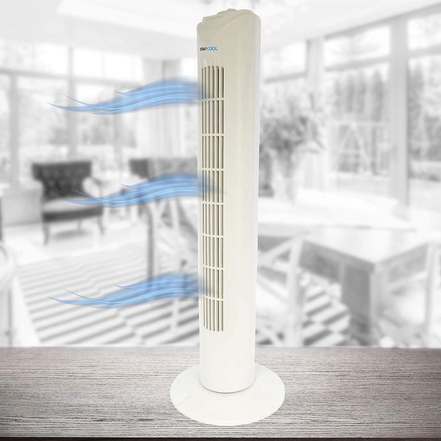 Lloytron 32'' white tower fan on a wooden surface with blue airflow lines in a bright room background