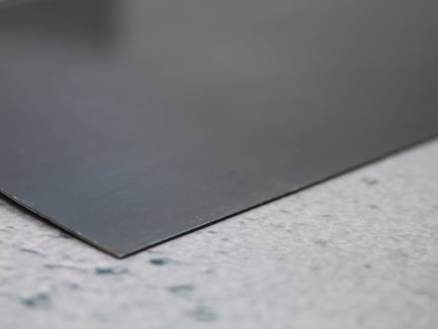 Close-up of the smooth blue steel blade edge of the Faithfull Drywall Taping Knife 300mm.