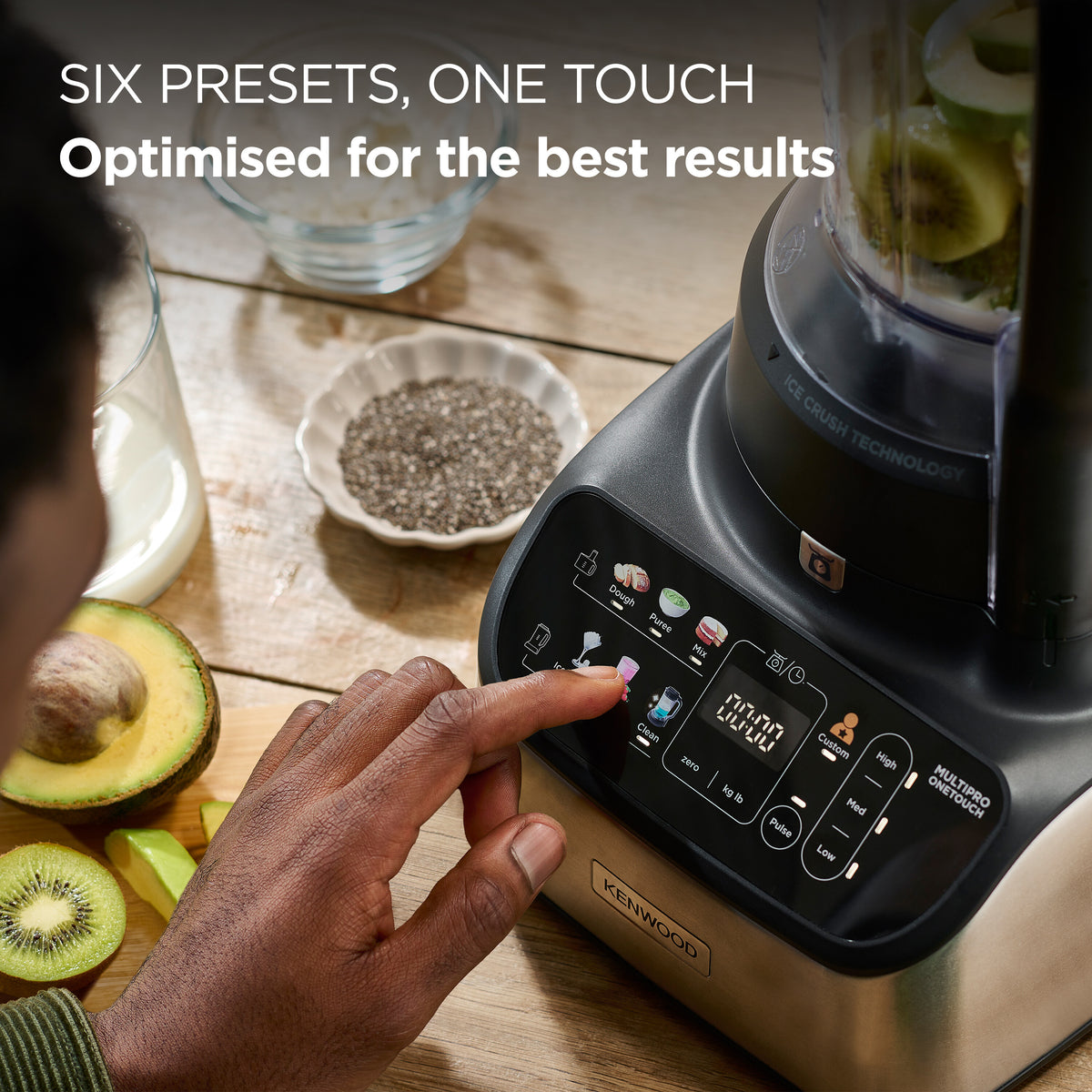 Close-up of a hand selecting a preset on the Kenwood 7-in-1 Multipro Express food processor touchscreen panel.