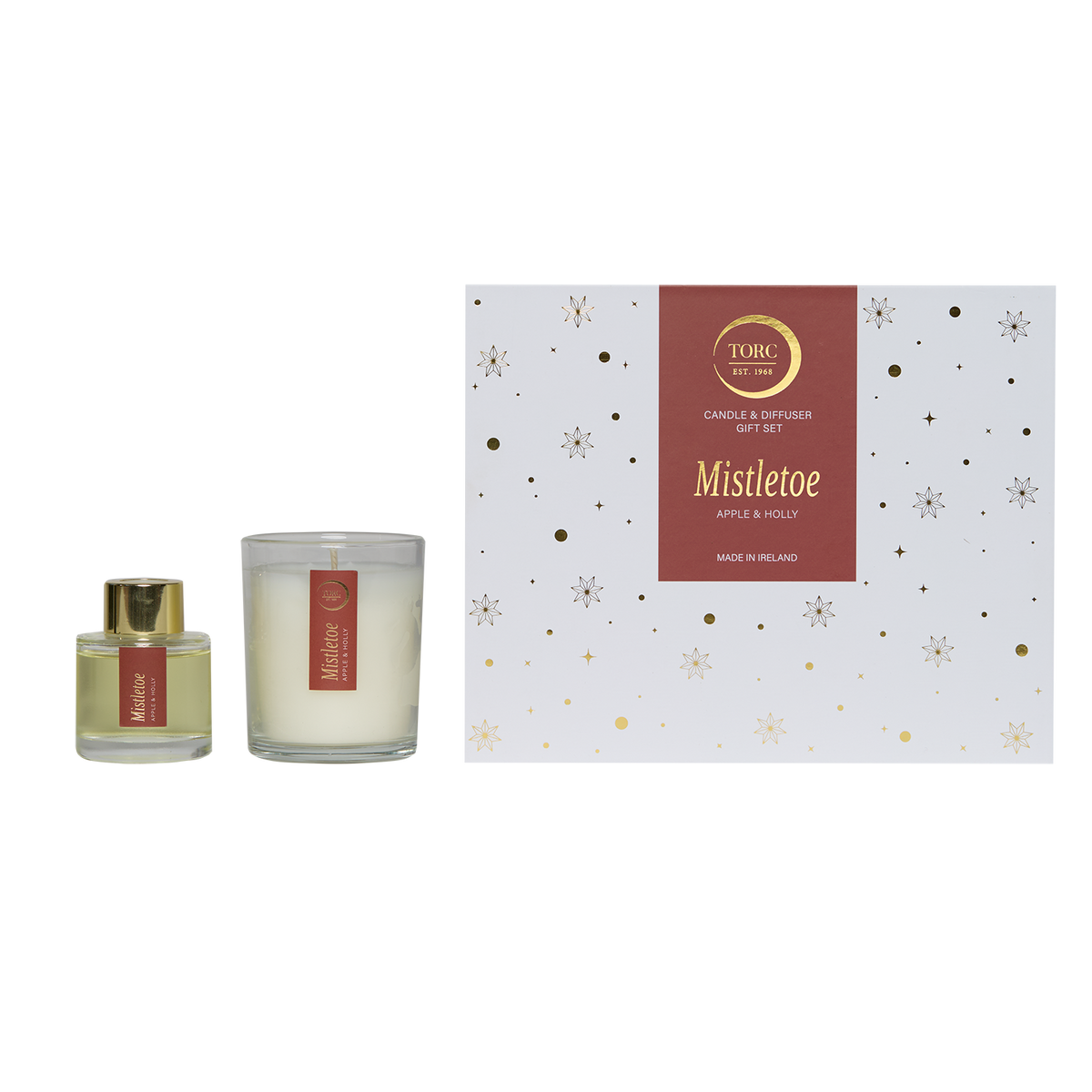 Torc Mistletoe Christmas gift set with candle, diffuser bottle, and festive white box with gold stars
