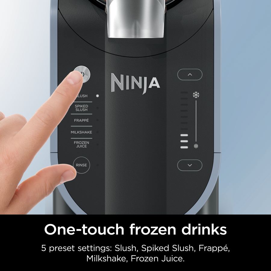 Close-up of Ninja SLUSHi frozen drink maker control panel with finger pressing power button and preset options visible.