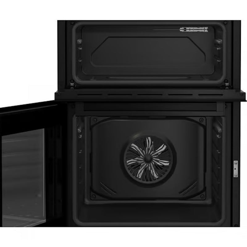 Beko 60cm Twin Cavity Electric Cooker FTC6701K showing open twin ovens with fan inside lower cavity