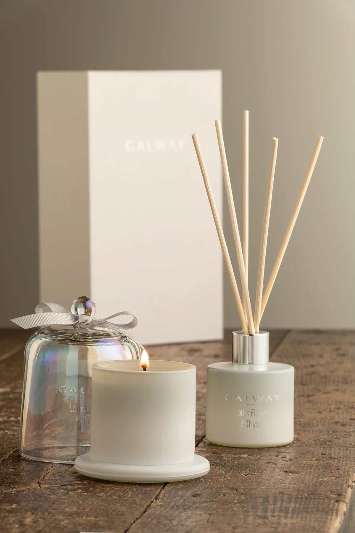 Lotus Flower & Thyme scented gift set with reed diffuser and bell jar candle, beautifully packaged by Keans Claremorris