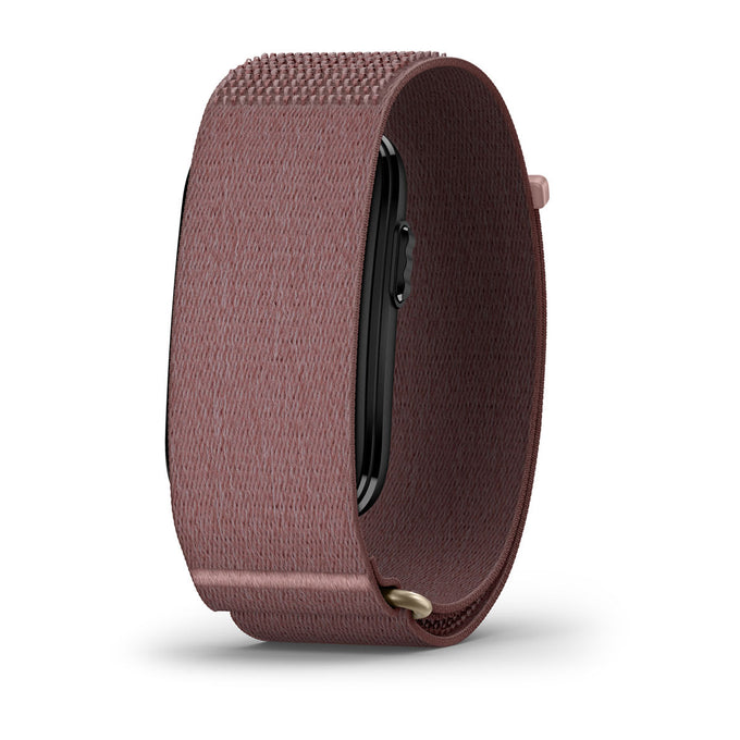 A rose gold textured fabric smartwatch band shown from a side profile view, attached to a black smartwatch, on a clean white background.