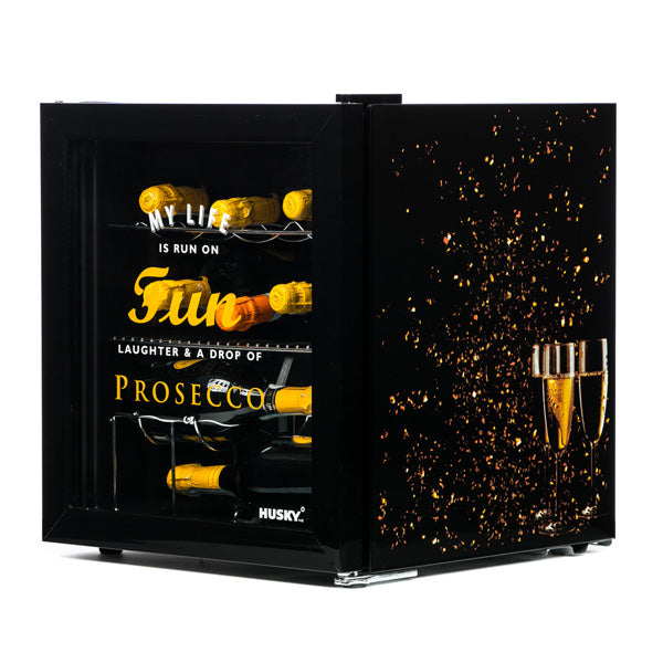 Husky Prosecco Drinks Cooler with black glass door, gold bottle caps inside, and sparkling prosecco glasses on side panel