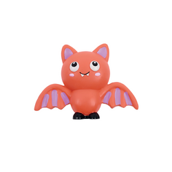 A cute cartoon bat toy or figurine in bright orange-red with light purple wings and inner ears, large white eyes, and small black feet, centered on a plain white background.