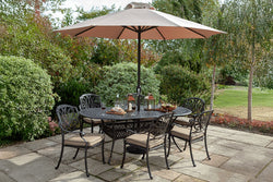 Amalfi 6 seat bronze oval garden furniture set with waterproof cushions, parasol, and concrete base – Keans Claremorris