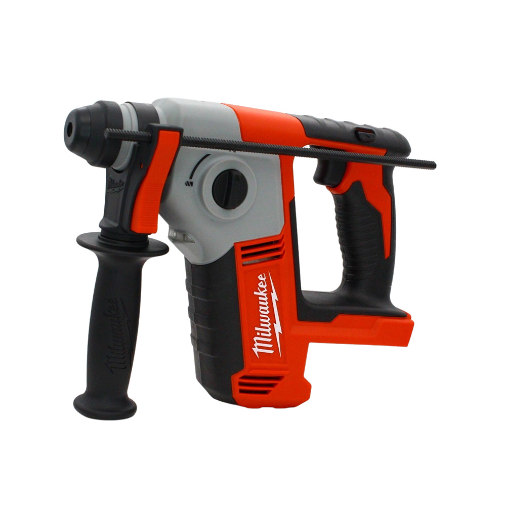 Milwaukee M18 Compact SDS+ hammer drill in red and black with side handle and depth rod attached.