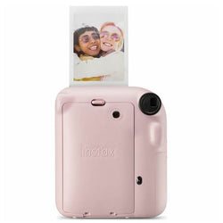 Instax Mini 12 Powder Pink instant camera with compact design, perfect for instant photos – available at Keans Claremorris.
