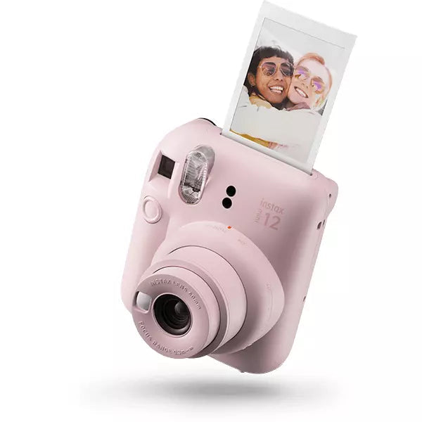 Instax Mini 12 Powder Pink instant camera with selfie mirror, close-up mode, auto flash, includes 2 AA batteries - Keans