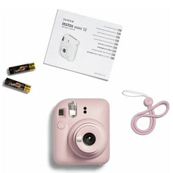Instax Mini 12 Powder Pink instant camera with compact design, perfect for instant photos – available at Keans Claremorris.