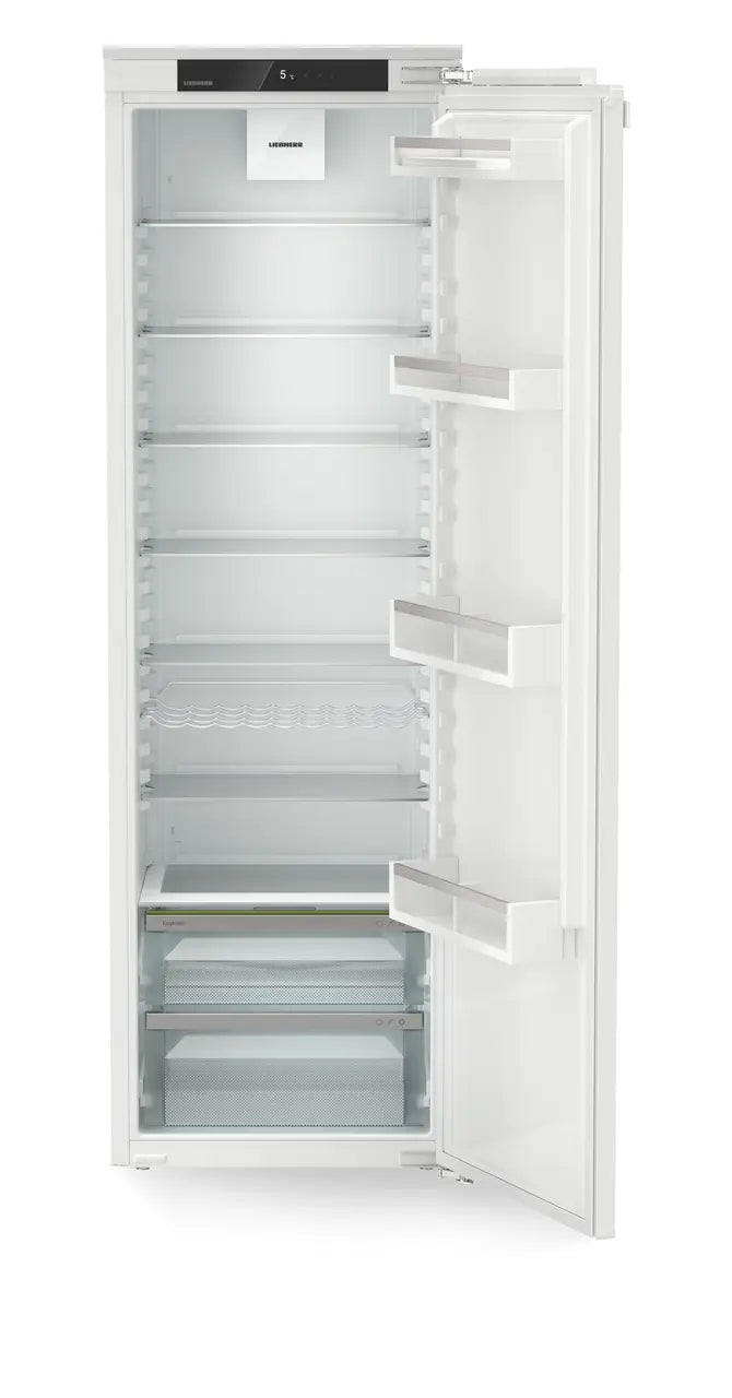 Liebherr Fully Integrated Fridge IRE5100 with open door showing shelves, door bins, and two vegetable drawers.