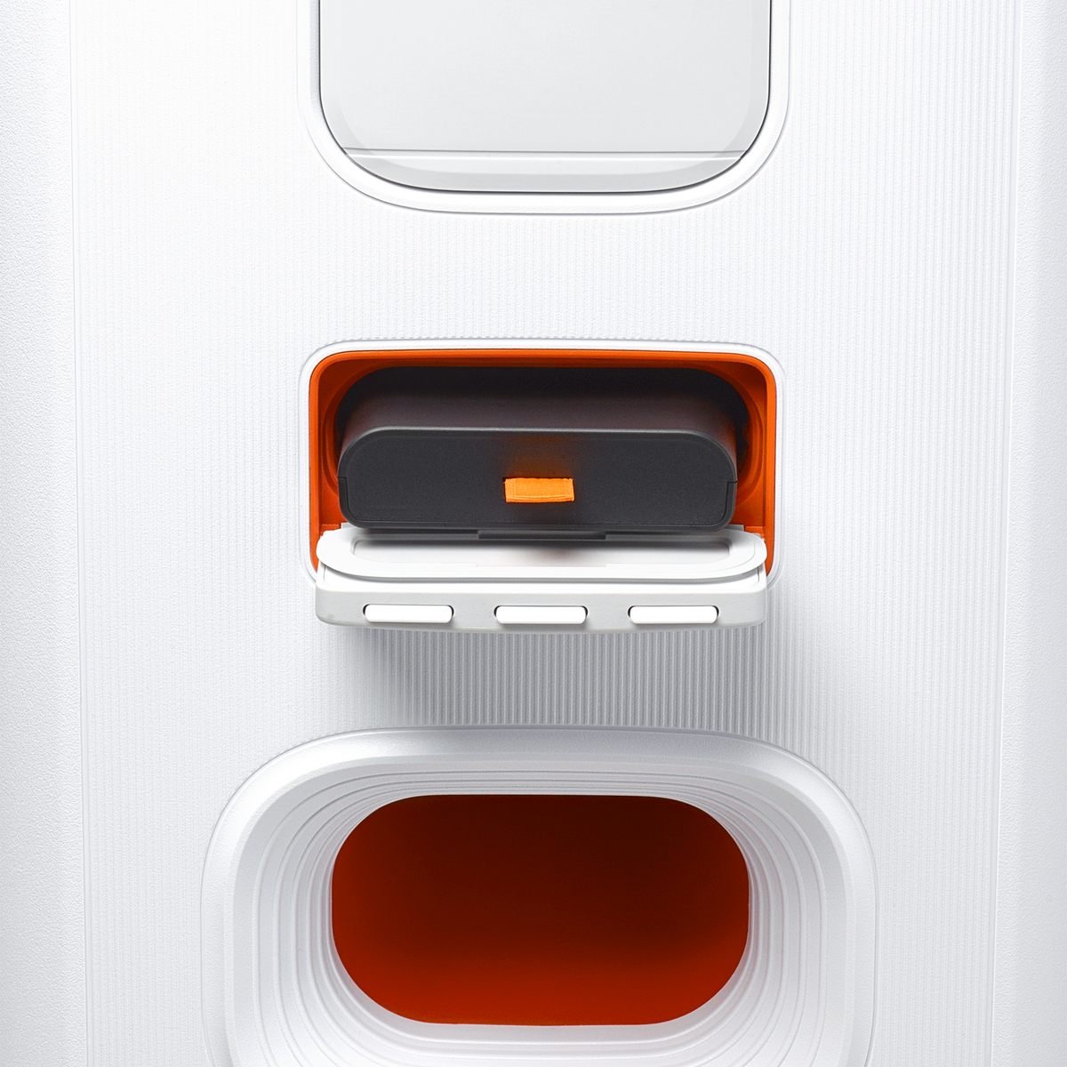 Close-up of the JBL PartyBox Stage 320 White showing the battery compartment with an orange interior and black battery pack.