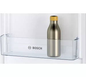 Close-up of Bosch Series 2 fridge door shelf with a metallic bottle inside.