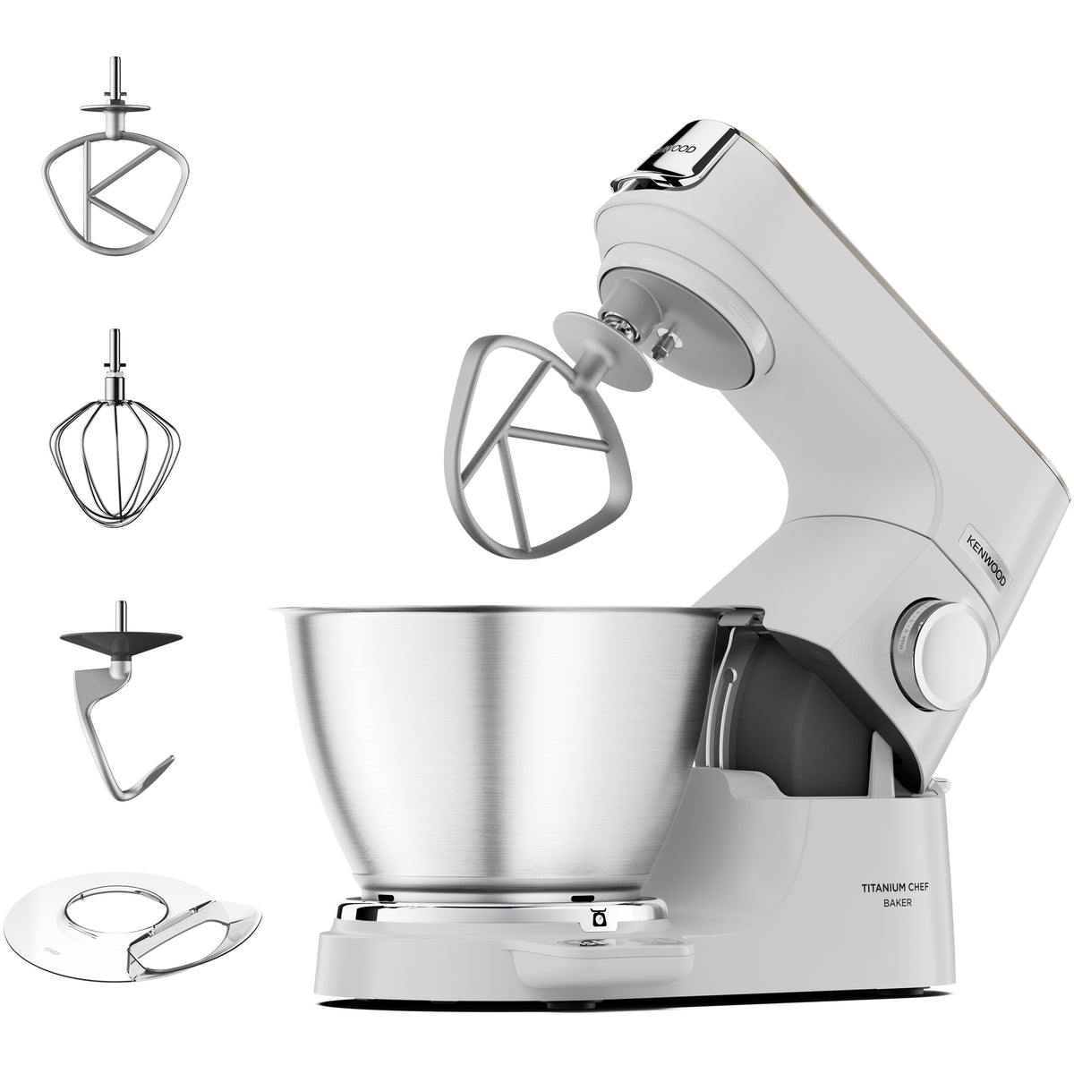 A white stand mixer with a stainless steel bowl and multiple metal attachments shown on a clean white background. The mixer body has visible branding and model text, and the attachments are arranged to the left of the main mixer.