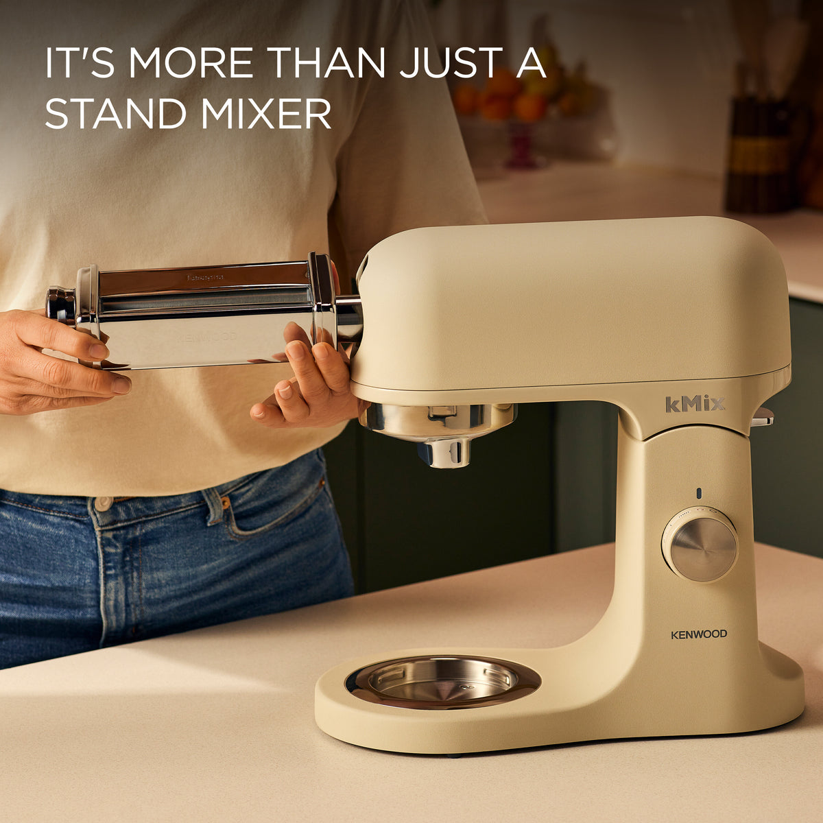 Kenwood stand mixer with pasta attachment on a kitchen counter