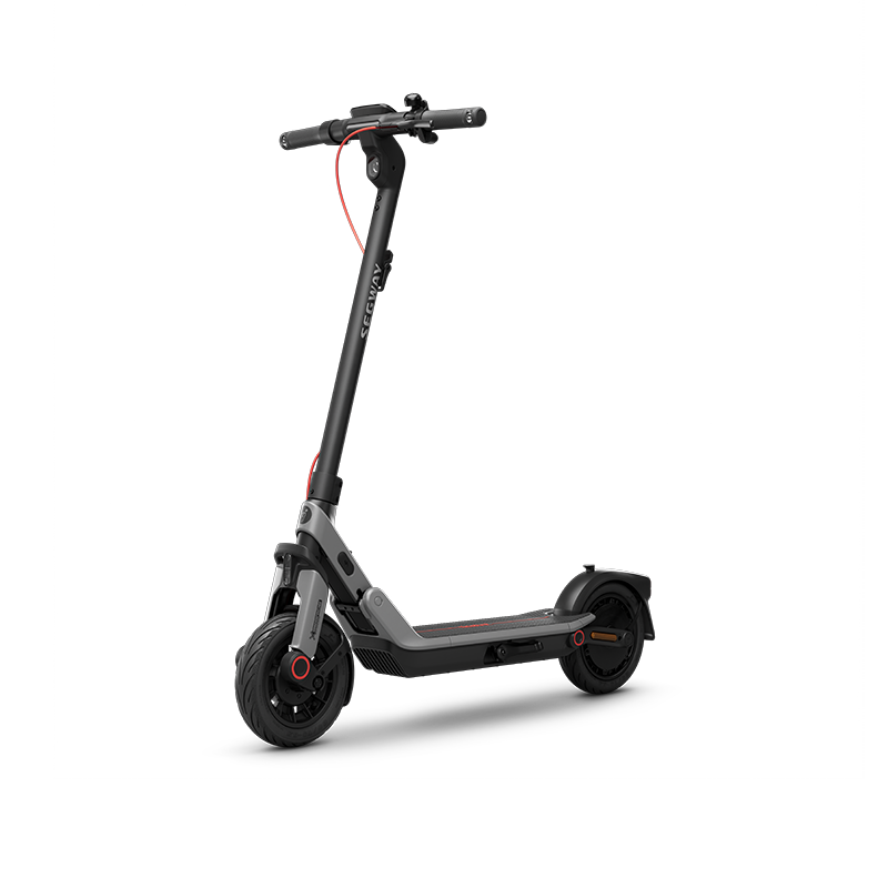 A folding electric scooter with a matte black frame and deck, featuring small red accents on the handlebar cable and wheel hubcaps, shown on a solid white background.