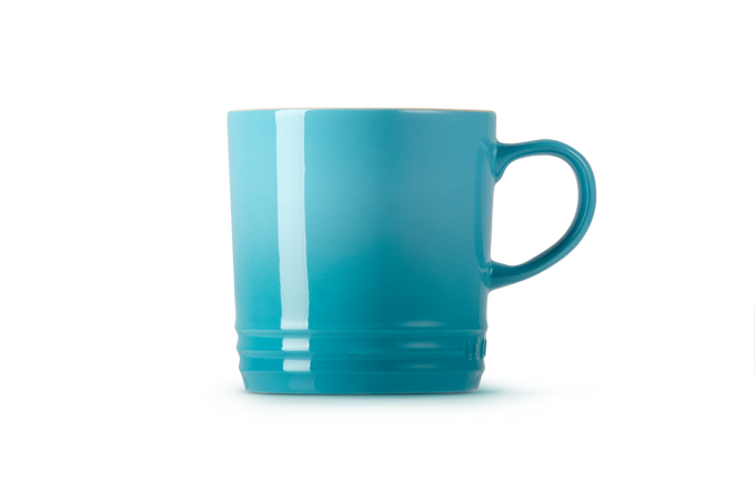 Le Creuset teal stoneware mug, durable and stylish, available at Keans Claremorris.
