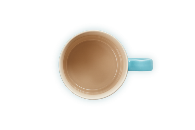 Le Creuset teal stoneware mug, durable and stylish, available at Keans Claremorris.