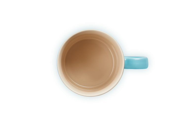 Le Creuset teal stoneware mug, durable and stylish, available at Keans Claremorris.