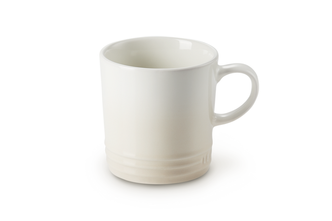 Le Creuset 350ml Meringue stoneware mug, durable, heat-retentive, scratch-resistant glaze – available at Keans Claremorris.