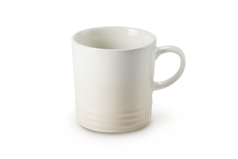 Le Creuset 350ml Meringue stoneware mug, durable, heat-retentive, scratch-resistant glaze – available at Keans Claremorris.