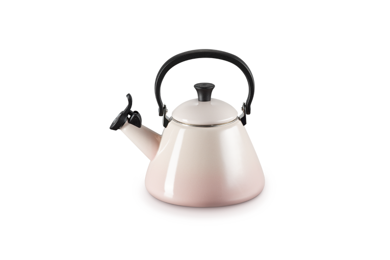 Le Creuset 1.6L Shell Pink stovetop kettle with foldable handle, enamelled carbon steel, whistle, at Keans Claremorris.