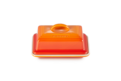 Le Creuset Butter Dish Volcanic orange ceramic, durable and stylish – available at Keans Claremorris.