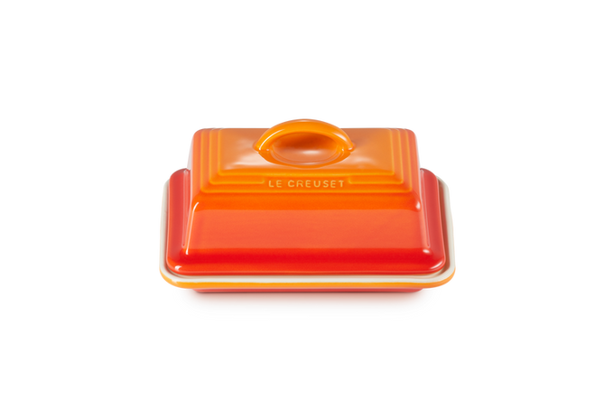 Le Creuset Butter Dish Volcanic orange ceramic, durable and stylish – available at Keans Claremorris.