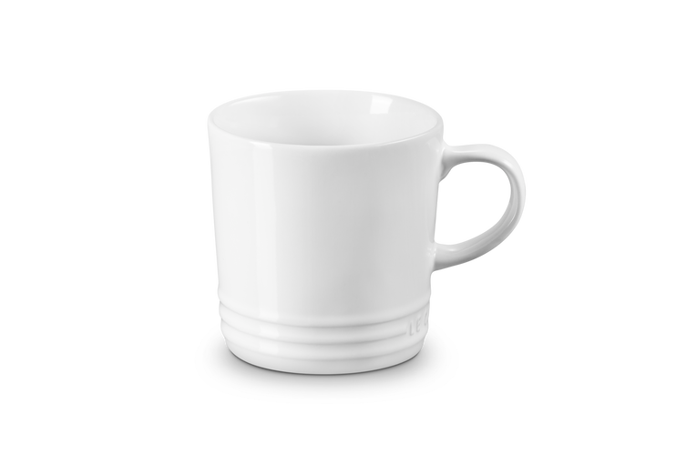 Le Creuset 350ml white stoneware mug, durable, heat-retentive, scratch-resistant glaze – available at Keans Claremorris.