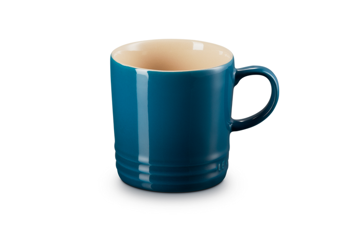 Le Creuset 350ml Deep Teal stoneware mug, durable, heat-retentive, scratch-resistant glaze – available at Keans Claremorris.
