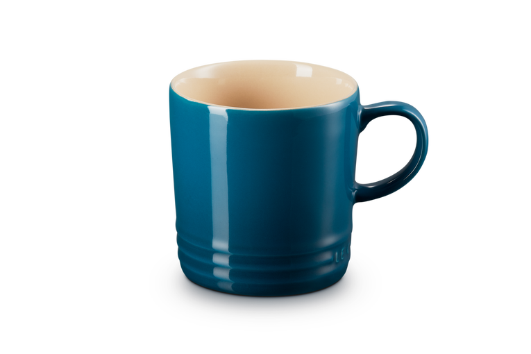 Le Creuset 350ml Deep Teal stoneware mug, durable, heat-retentive, scratch-resistant glaze – available at Keans Claremorris.