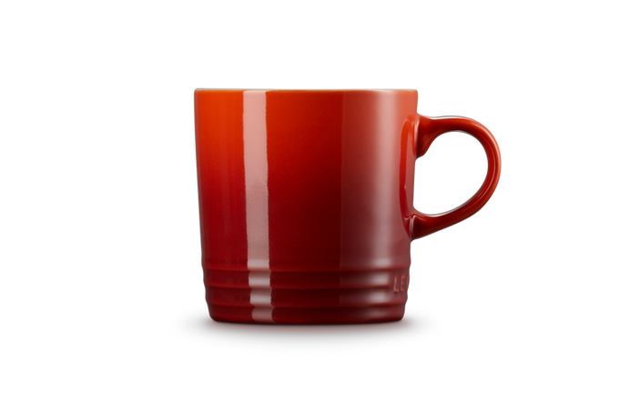 Le Creuset Stoneware Mug in Cerise red, durable and vibrant, available at Keans Claremorris.