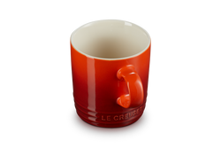 Le Creuset Stoneware Mug in Cerise red, durable and vibrant, available at Keans Claremorris.