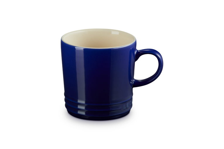 Le Creuset 350ml Indigo stoneware mug, durable, heat-retentive, scratch-resistant glaze – available at Keans Claremorris.
