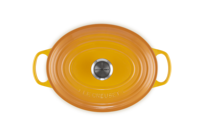Le Creuset Oval Casserole 27cm in Nectar orange, durable cast iron cookware - Keans Claremorris