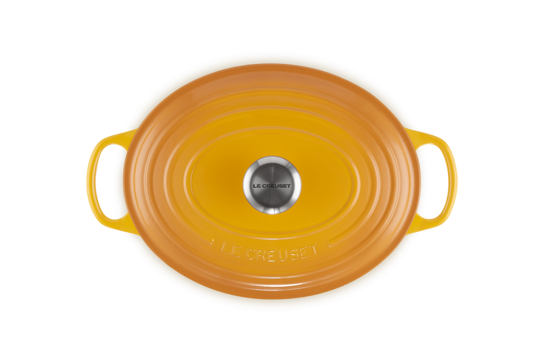 Le Creuset Oval Casserole 27cm in Nectar orange, durable cast iron cookware - Keans Claremorris